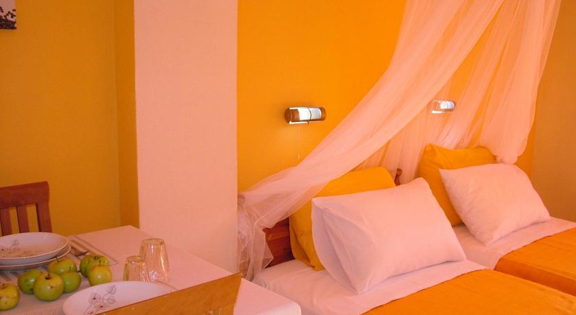 Angeliki Aparthotel Vitaládes Rum bild